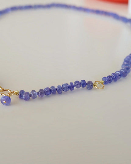 Tanzanite Tennis Necklace – 5-6mm Beads, Hand-Knotted on Lavender Silk with 14K Gold S Clasp & Charm (Adjustable 18–20")
